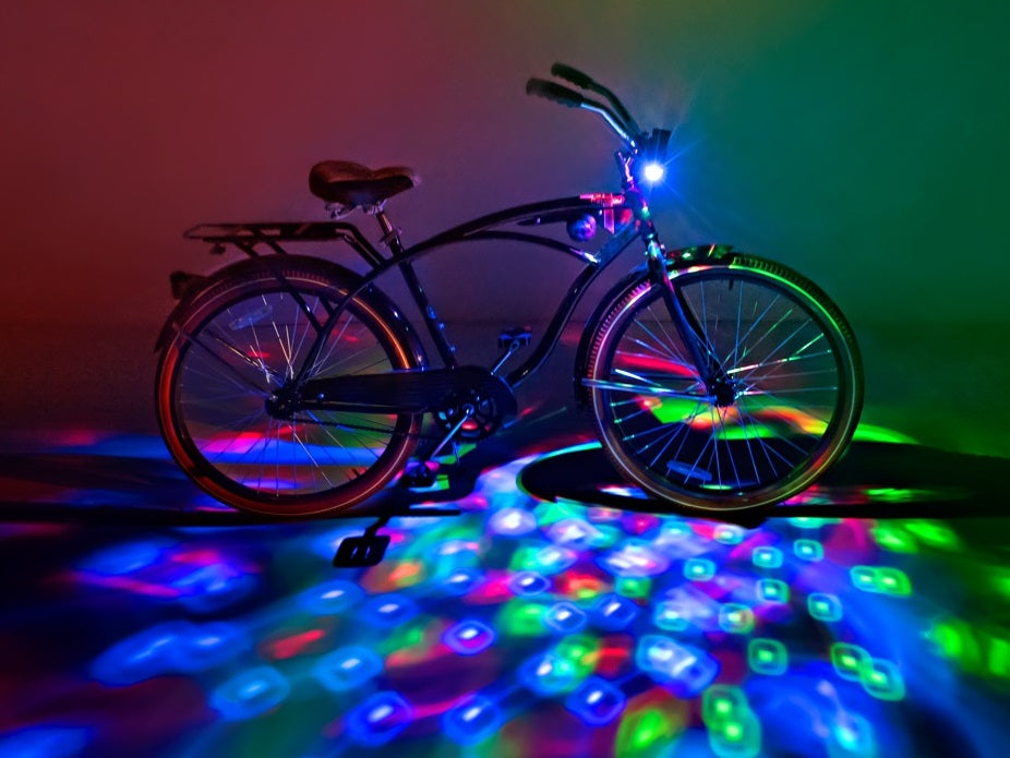 Brightz L5885 Cruzin Bicycle Bike LED Lights - Red, blue, and green LEDs shine through a lens to project ground effect patterns